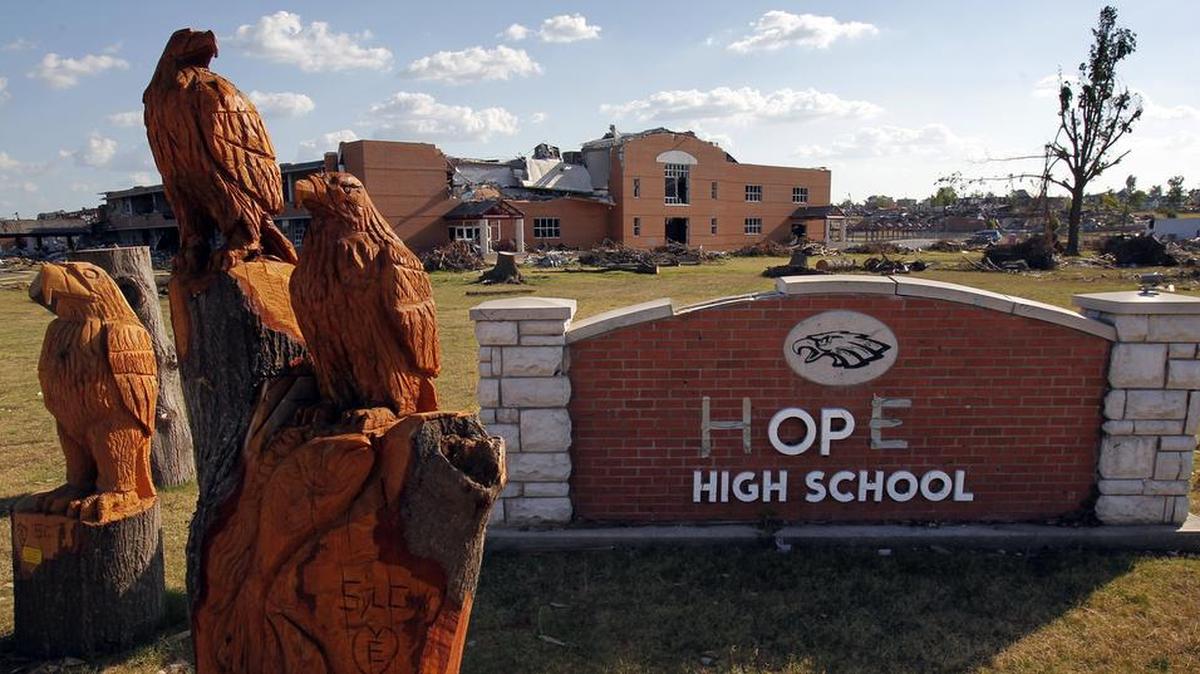 Carved eagles, the mascot for Joplin schools, stood near the destroyed high school on July 18, 2011.