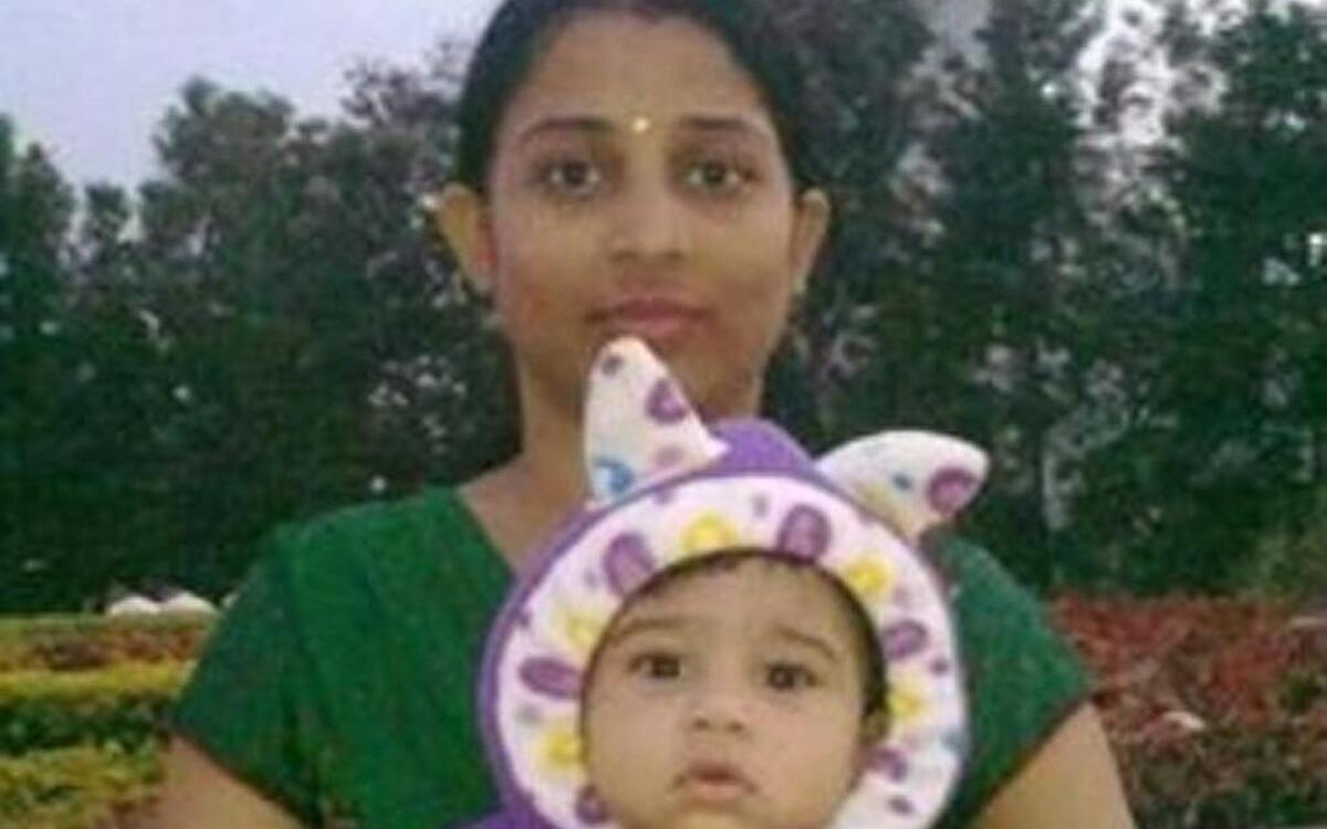 Annu Jha and one of her children