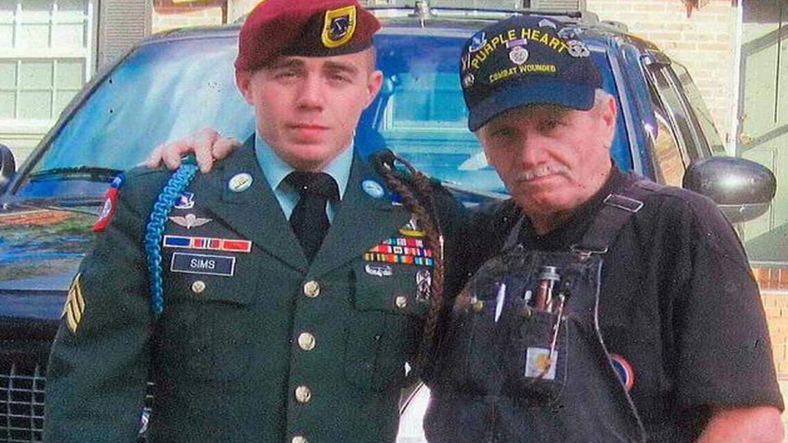 
Issac Sims, left, with his father Adrian Sims.
