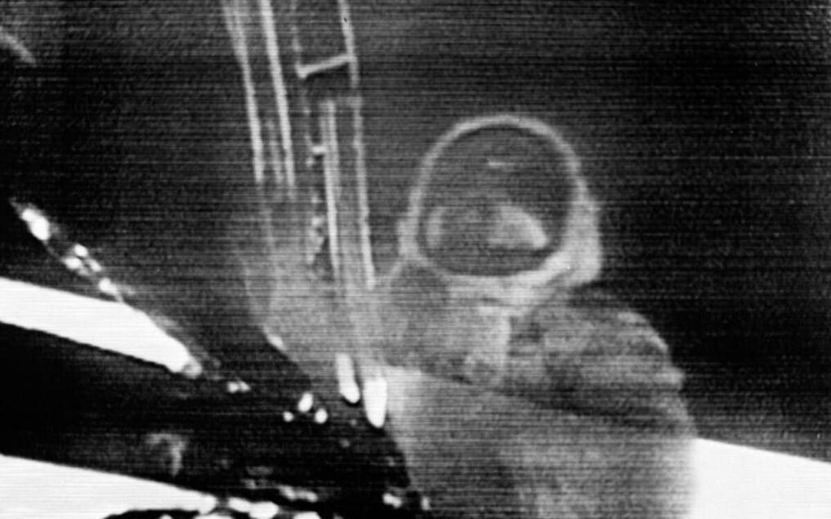 Apollo 11 astronaut Neil Armstrong steps on surface of the moon on July 20, 1969. A bag he carried on the moon was sold for more than $1 million at an auction Thursday in New York.