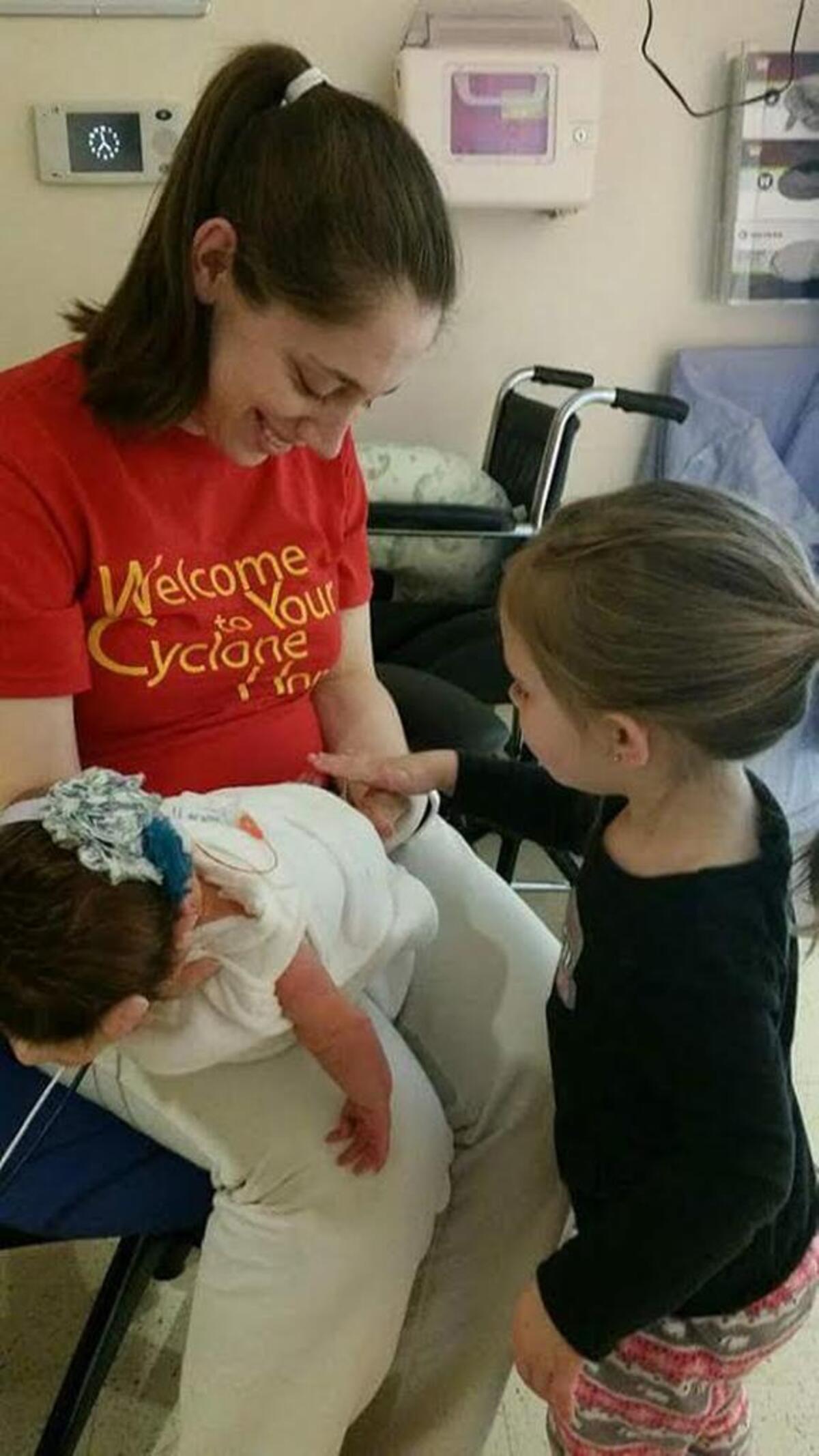 Julia Rotert encountered a Facebook post offering to sell a disabled parking placard. Rotert, pictured here with daughters 3-year-old Haylee and 1-year-old Piper, said her youngest has a disability that qualifies her for a placard. “These aren’t for convenience,” Rotert said. “They’re given to people because they need them.”
