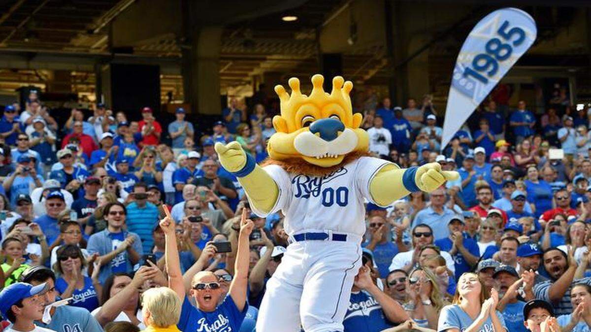 
To celebrate the Kansas City Royals’ first playoff appearance in 29 years, fans and the Royals came together at a “Take the Crown” rally at Kauffman Stadium on Monday. Royals mascot Sluggerrr warmed up the crowd at the start of the rally.
