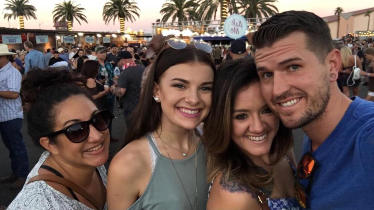 Jaelyn Duran (second from left), a recent graduate of Raymore-Peculiar High School, was at the Route 91 Harvest country music festival with her sister, Sarah (second from right), and two friends Sunday, Oct. 1, 2017, when multiple shots were fired at convert-goers from the Mandalay Bay Casino and Resort in Las Vegas. This cellphone photo taken earlier in the night before authorities say 64-year-old Stephen Paddock opened fire. Fifty-nine people died, including Paddock, and more than 500 were injured in the deadliest mass shooting in U.S. history.