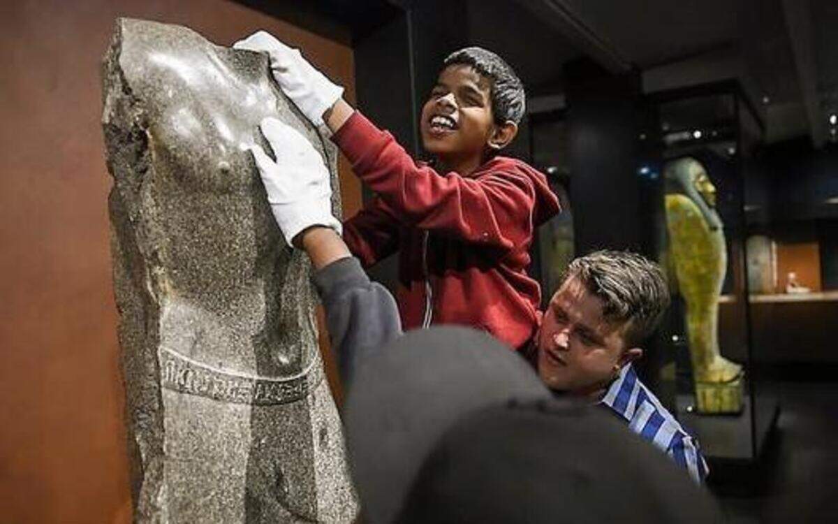 
A group of students from Alphapointe Association for the Blind experienced three-dimensional art while wearing white cotton gloves at the Nelson-Atkins Museum of Art.
