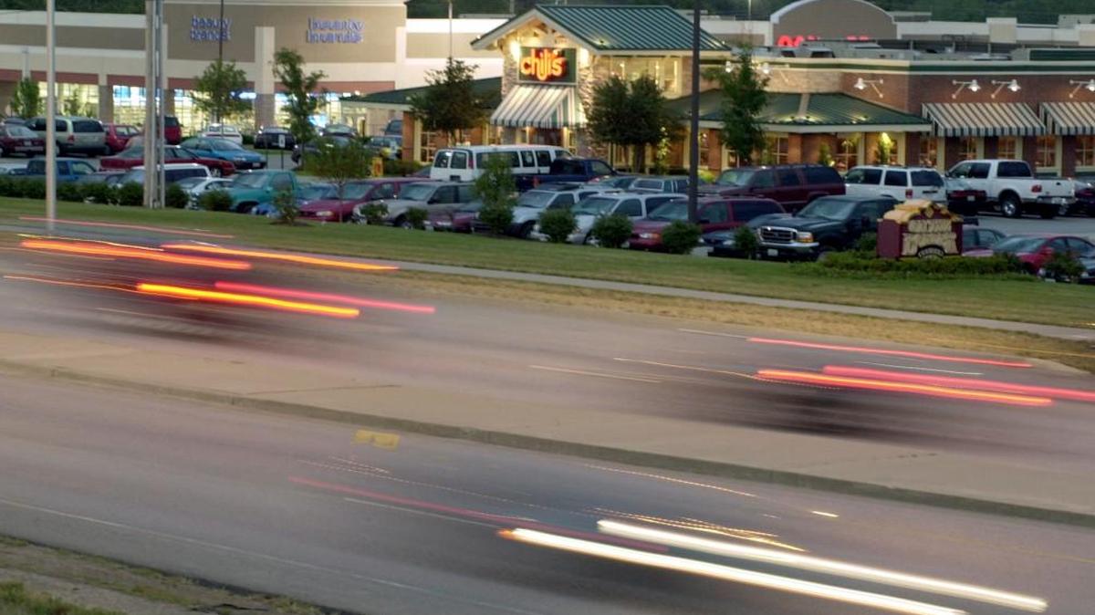Looking east from the Missouri 152/Interstate 29 overpass, traffic streaks down Barry Road. The ramps from Missouri 152 leading onto I-29 and a lane of I-29 from Barry Road to Tiffany Springs Road will be closed Friday night into Saturday morning for construction.