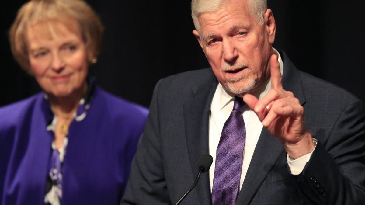 Richard Myers, right, speaks to a crowd gathered for a Kansas Board of Regents meeting with his wife Mary Jo, left, after being named president of Kansas State University in Manhattan, Kan., Tuesday, Nov. 15, 2016. Myers has been serving as interim president at the university.