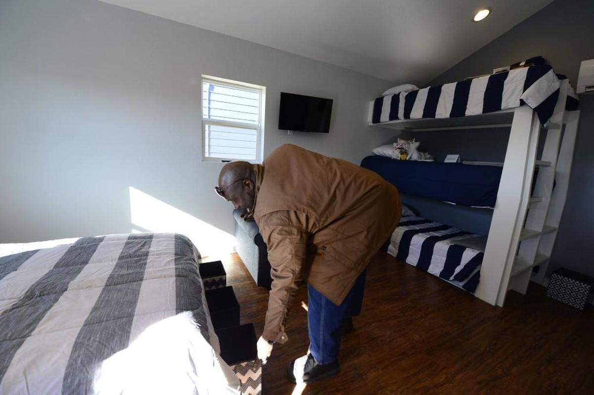 Marvin Gregory, a veteran who has been homeless, on Monday checked out a tiny house in Kansas City from the Veterans Community Project that he can call home for the next six to 12 months.