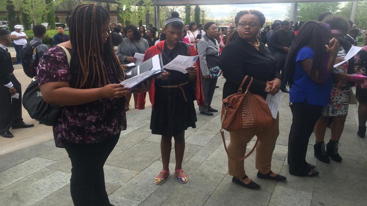Hundreds flocked to the Kauffman Foundation Conference Center to meet with private employers and others offering jobs and internships for young people at a summer job fair Saturday.