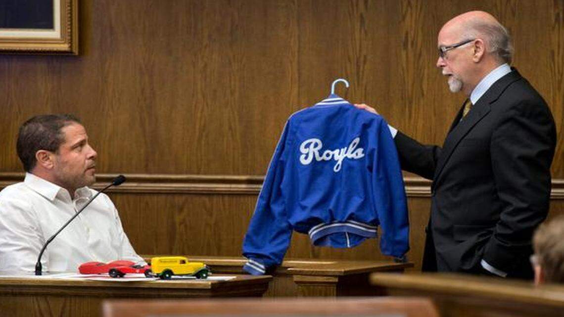 
Jon David Couzens (left) spent more than three hours Friday in Jackson County Circuit Court telling a jury about the sexual abuse he says he endured at the hands of Monsignor Thomas O’Brien. His attorney Pedro Irigonegaray carried a small Royals jacket that Couzens said he wore when he was 10 years old, the age he was when he says the abuse began. 
