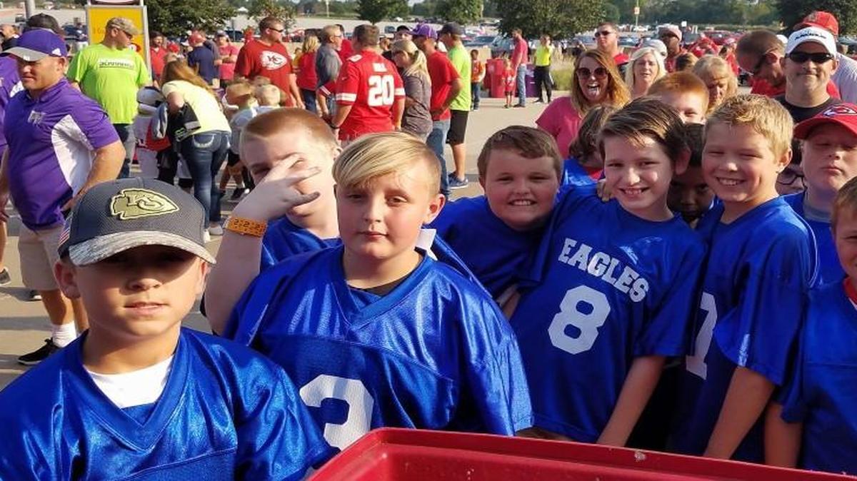 Football players in the Grain Valley Sports League at the Aug. 31 Chiefs game.