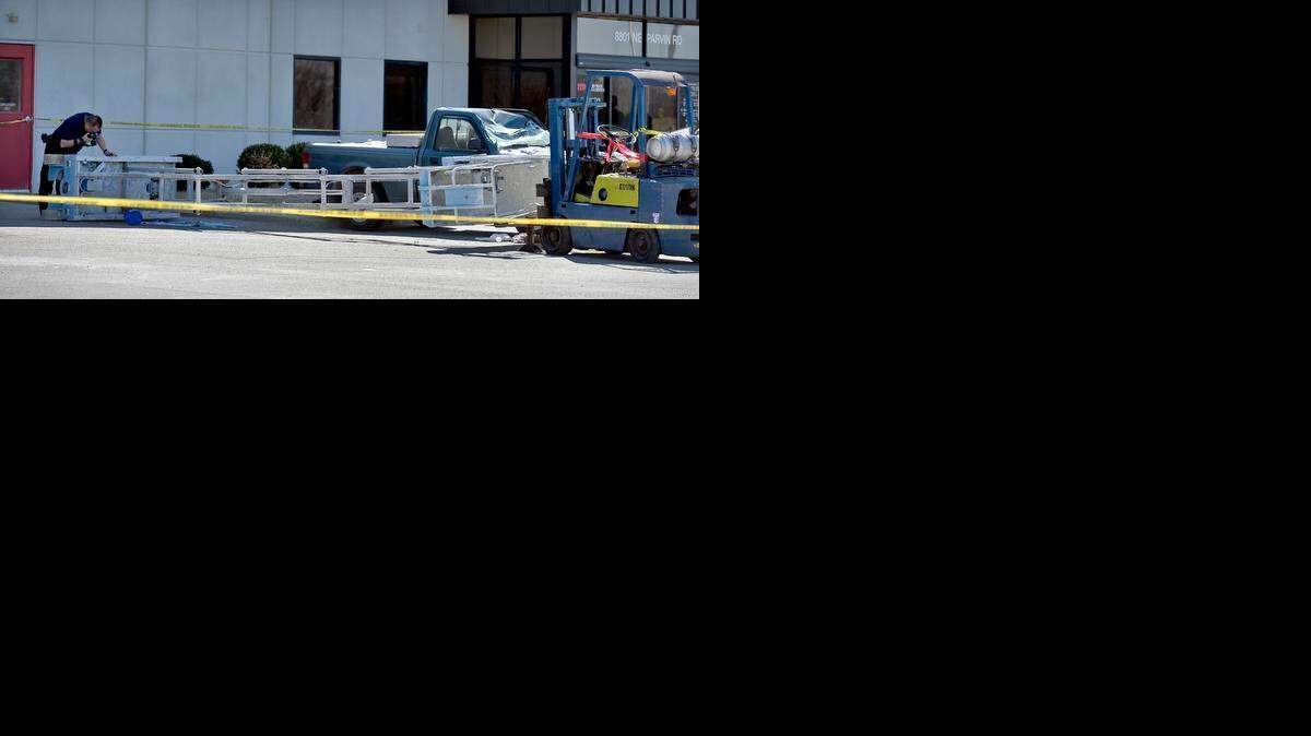 
Police investigated the death of a man on Thursday, March 12, 2015, that was working on a scissor lift that tipped over outside Inland Truck Parts and Service, 8801 N.E. Parvin Road, near Oceans of Fun.
