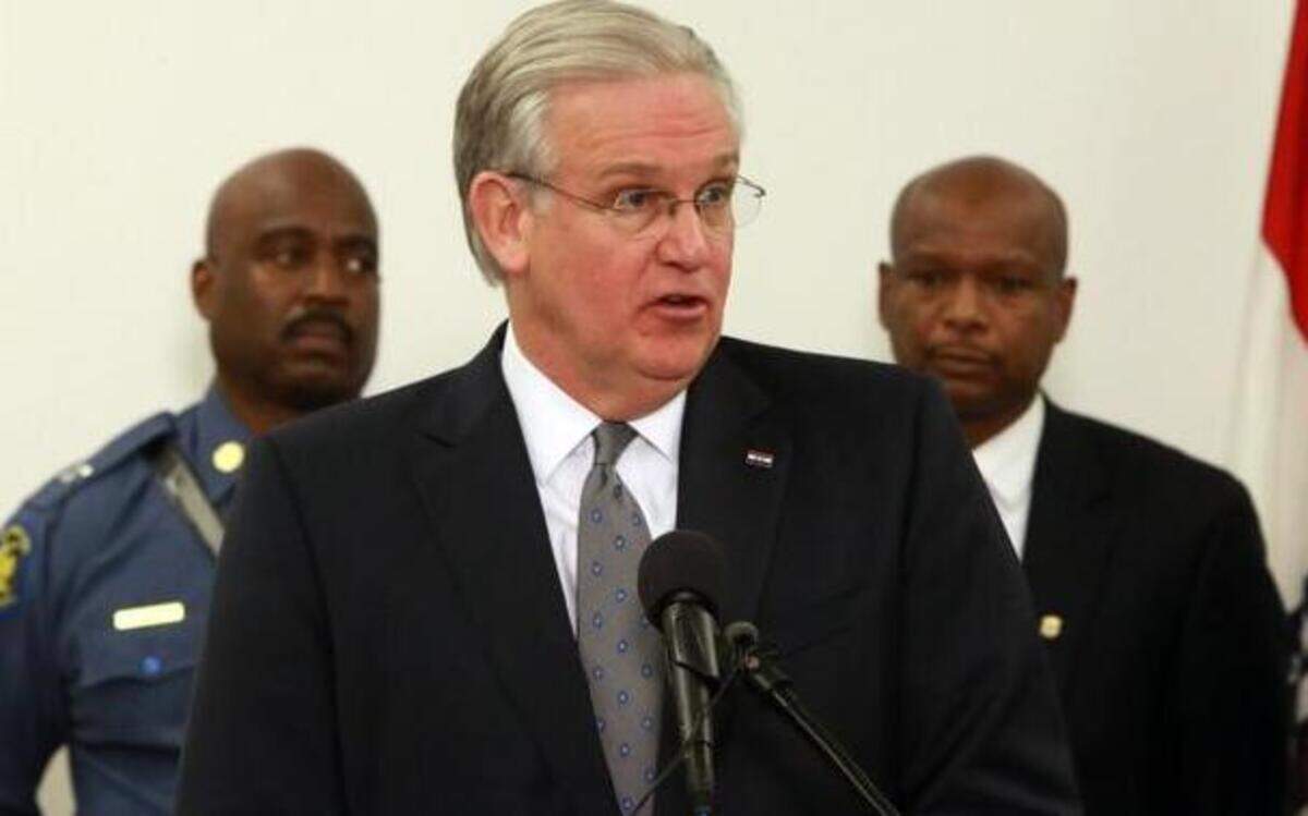 
Missouri Gov. Jay Nixon (center) spoke earlier this month about law enforcement plans in case violence erupts in Ferguson. Joining Nixon were Missouri Highway Patrol Capt. Ron Johnson (left) and Dan Isom, Missouri director of public safety.
