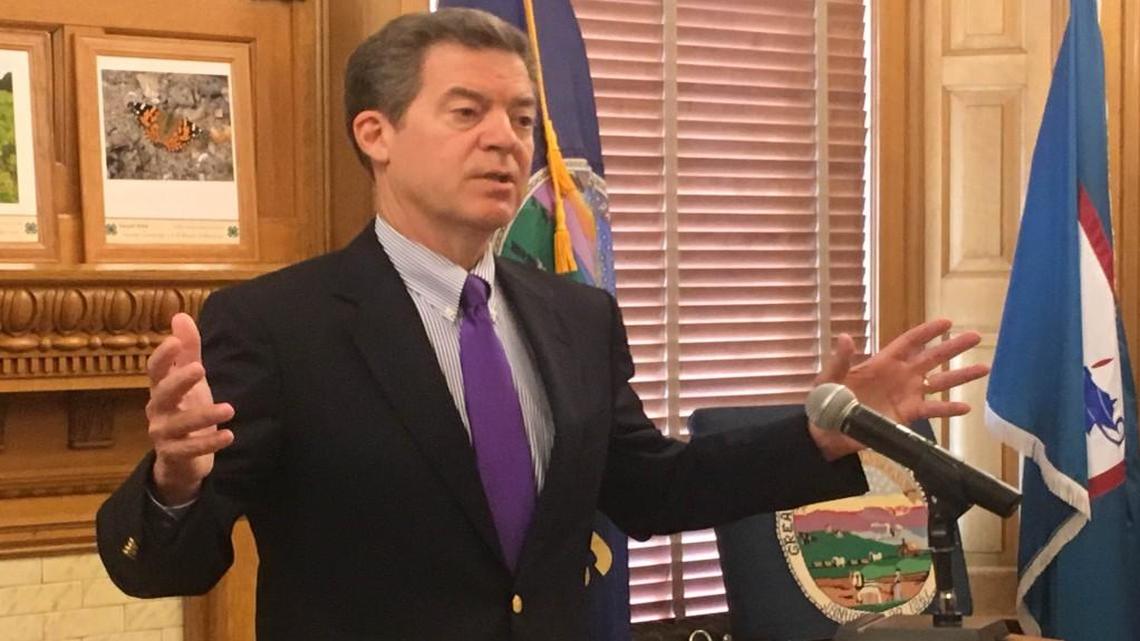 Gov. Sam Brownback held a news conference Friday in the Kansas Capitol.