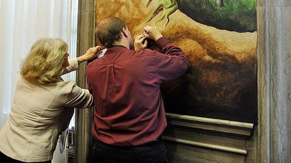 
One of the people who wrote on a business card atop a Thomas Hart Benton painting in the Missouri Statehouse was the vice chairwoman of the Missouri Republican Party. Valinda Freed apologized Sunday for what she described as a “thoughtless act.” 
