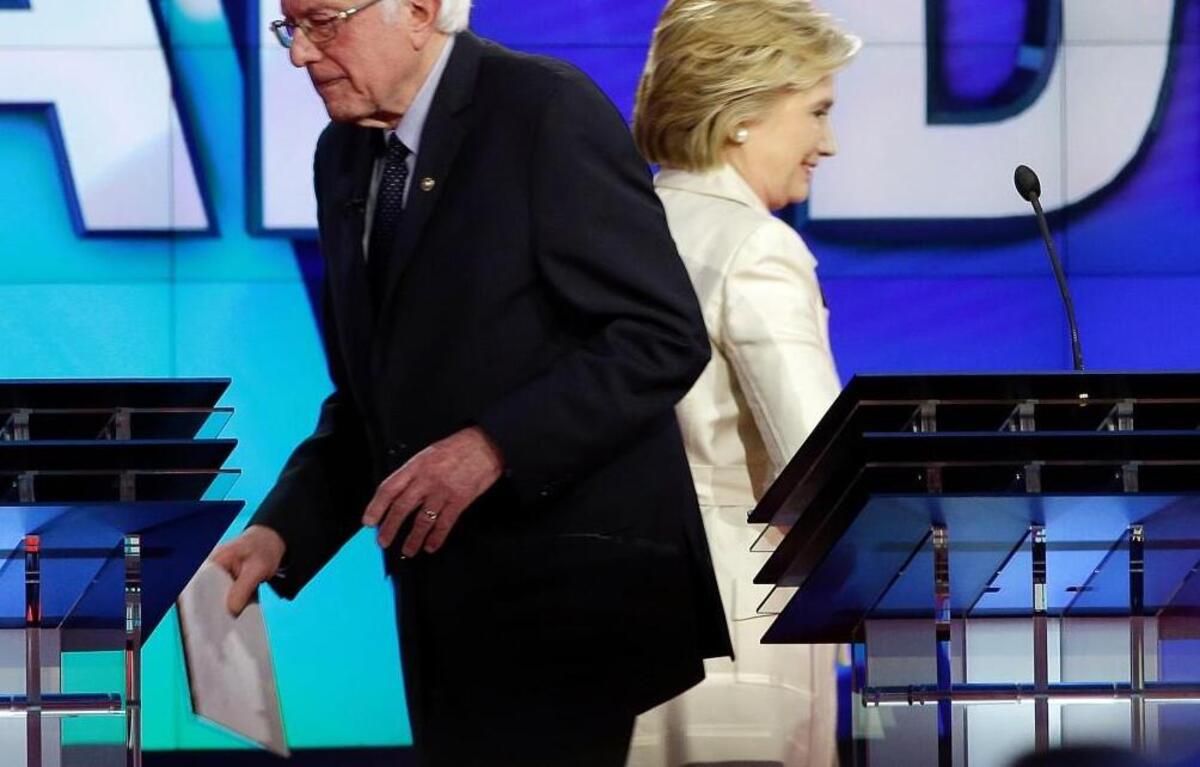 Hillary Clinton and Bernie Sanders didn’t just yell at each other Thursday night. At one point, they walk away from each other. Not much love.