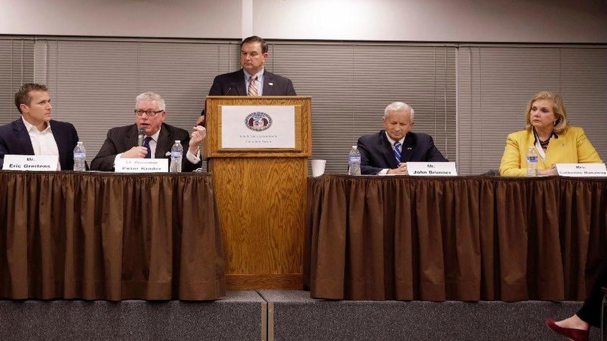 Missouri Republican gubernatorial candidates participate in a forum Tuesday, Nov. 3, 2015, in Jefferson City, Mo. Seated between moderator Mike Kehoe, who is standing, are candidates from left, state Sen. Bob Dixon (now withdrawn), former Navy SEAL Eric Greitens, Lt. Gov. Peter Kinder, businessman John Brunner and former Missouri House Speaker Catherine Hanaway.