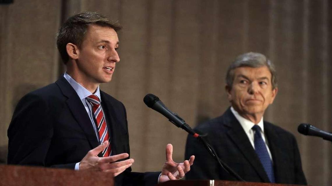 Jason Kander (left) debated Sen. Roy Blunt in Branson in September.