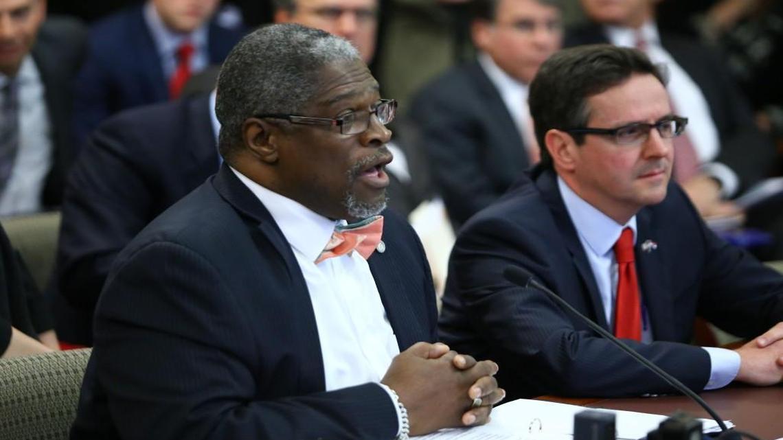 Kansas City Mayor Sly James (left) testified Thursday in Jefferson City in opposition to a bill repealing the city’s earnings tax, a measure sponsored by Sen. Kurt Schaefer.