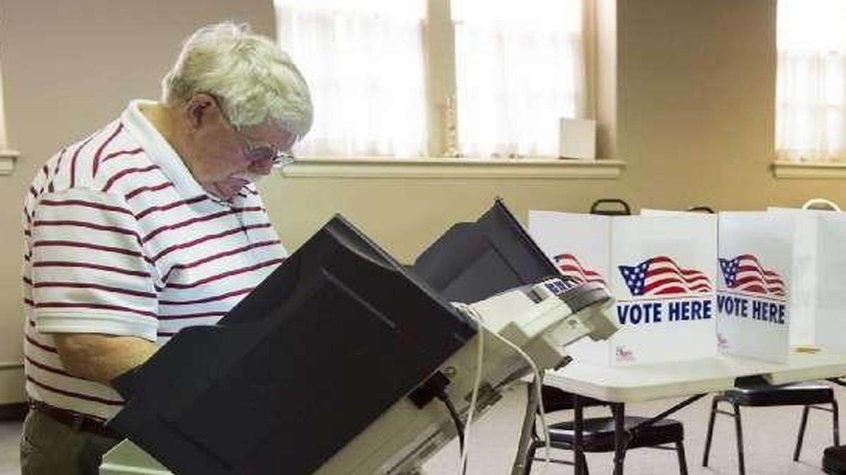 Voters including Bill Hopkins of Kansas City, cast their ballots Tuesday, June 23, 2015, at Wornall Road Baptist Church, 400 W. Meyer Blvd., in Kansas City.