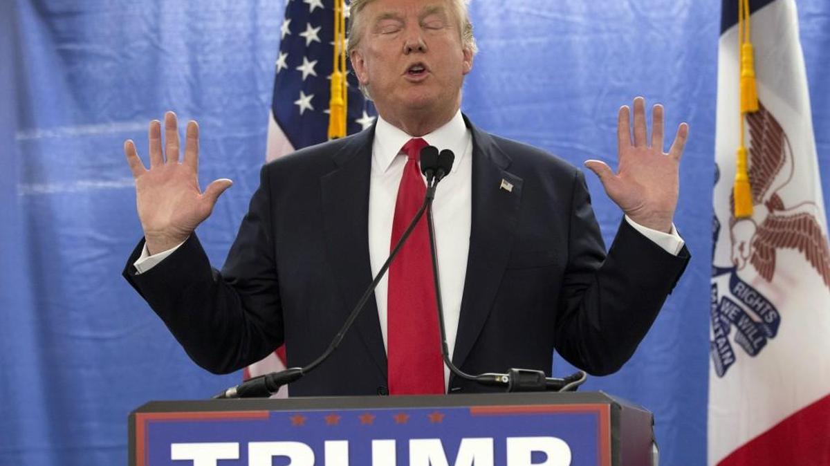 Republican presidential candidate Donald Trump spoke to reporters during a new conference Tuesday at the Roundhouse Gymnasium in Marshalltown, Iowa.