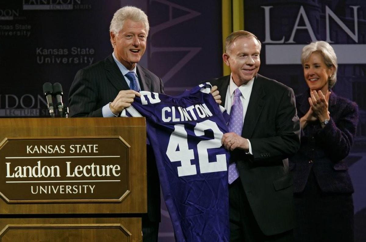 Former President Bill Clinton received a Kansas State University football jersey from KSU president JonWefald, center, and Kansas Gov. Kathleen Sebelius, right, after Clinton gave the 148th Landon Lecture at Bramlege Coliseum in 2007.