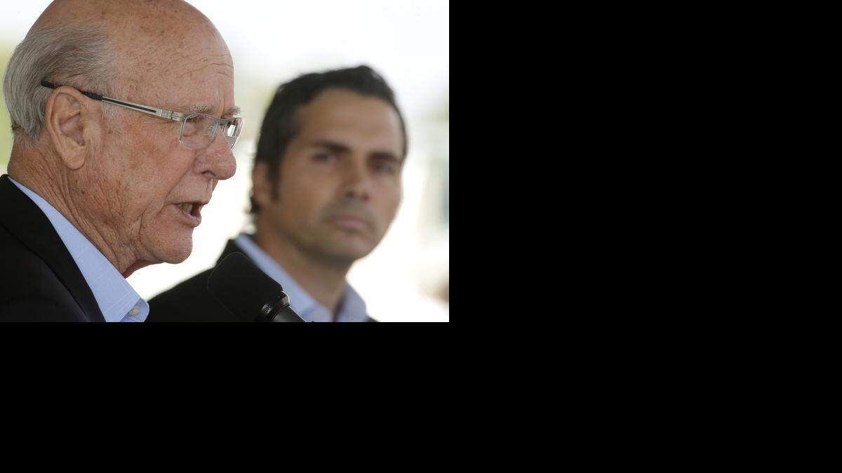 Republican Sen. Pat Roberts, left, answers a question while independent candidate Greg Orman listens during a debate at the Kansas State Fair Saturday, Sept. 6, 2014, in Hutchinson, Kan.