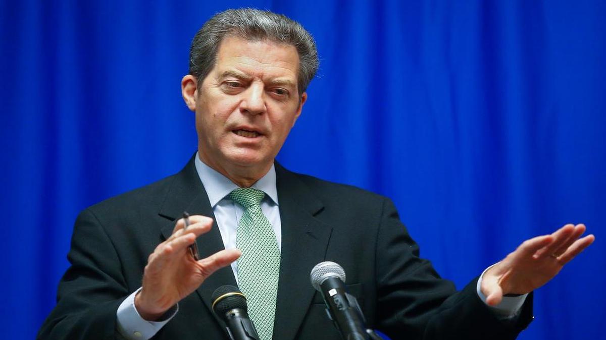 
Kansas Gov. Sam Brownback discusses the difficulty behind approving and funding a budget during a press conference on Tuesday at the Kansas Statehouse.
