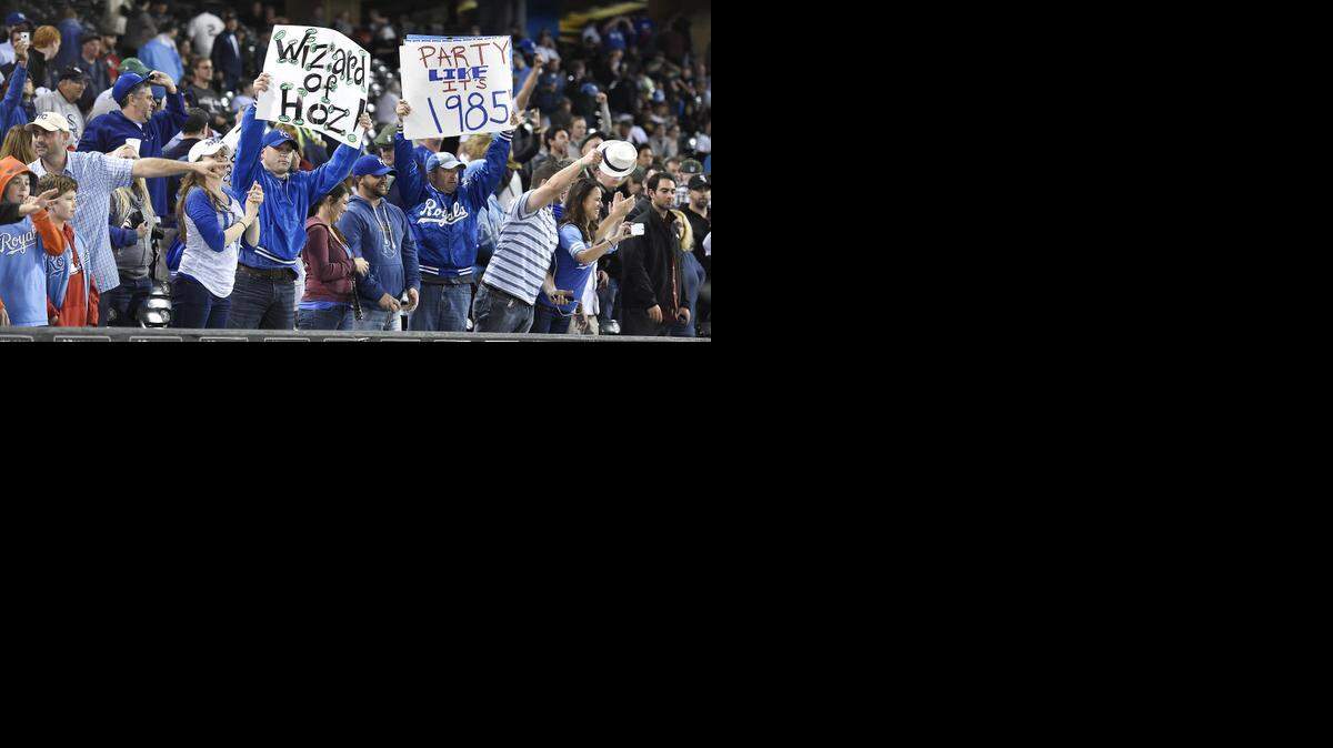 
Kansas City Royals fans celebrate the teams 6-3 win over the Chicago White Sox during Thursday's baseball game on September 25, 2014 at U.S. Cellular Field in Chicago, Ill.
