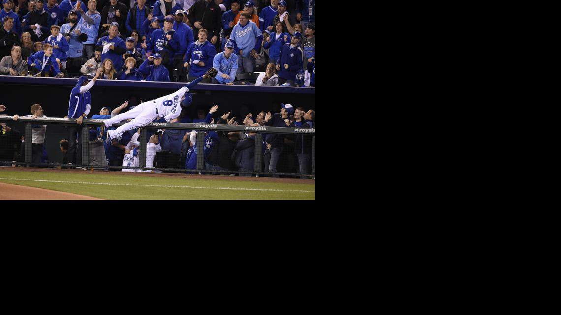 
Kansas City Royals third baseman Mike Moustakas went airborne to make a catch on a foul ball hit by Baltimore Orioles Adam Jones in the sixth inning Tuesday at ALCS playoff baseball game on October 13, 2014 at Kauffman Stadium in Kansas City, MO.
