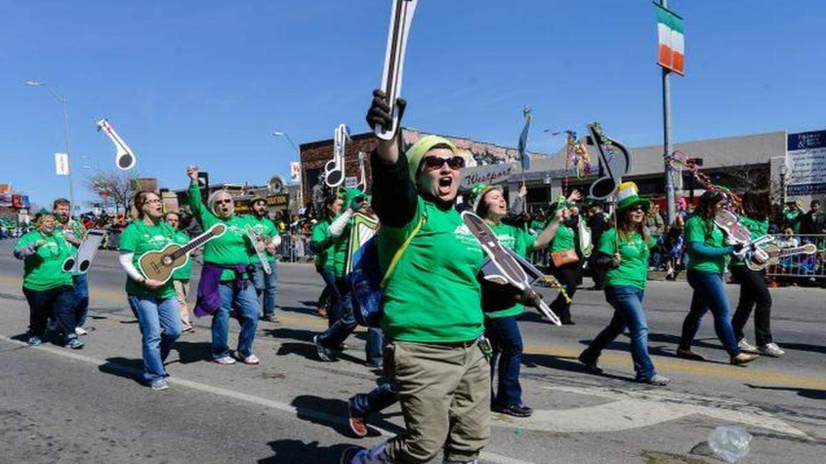 
Tuesday’s two-hour parade brought pomp and pageantry to the streets of Westport with bands and 110 floats. Of course, Kansas City has been celebrating St. Patrick’s Day since 1873, so the city has had plenty of practice. The Mid-Continent Public Library’s presentation featured marchers dancing with cutout musical instruments. 
