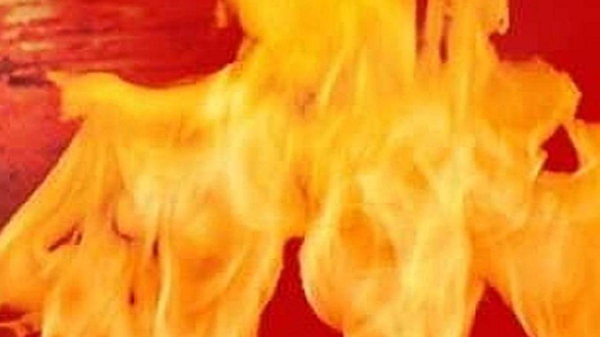 Firefighters rescued four people from a roof of their house after it caught fire early Monday, according to media reports.