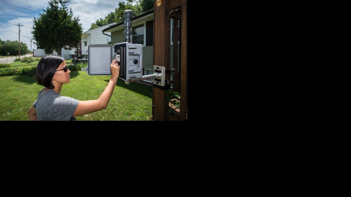 
Leticia DeCaigny, a community organizer with Global Community Monitor, set up a MiniVon air analyzer to monitor for diesel fumes and particulates near the BNSF’s rail yard in the Argentine neighborhood of Kansas City, Kan. Preliminary test results reveal levels of diesel exhaust high enough on some days to send the elderly to the hospital or raise the death rate among residents. 
