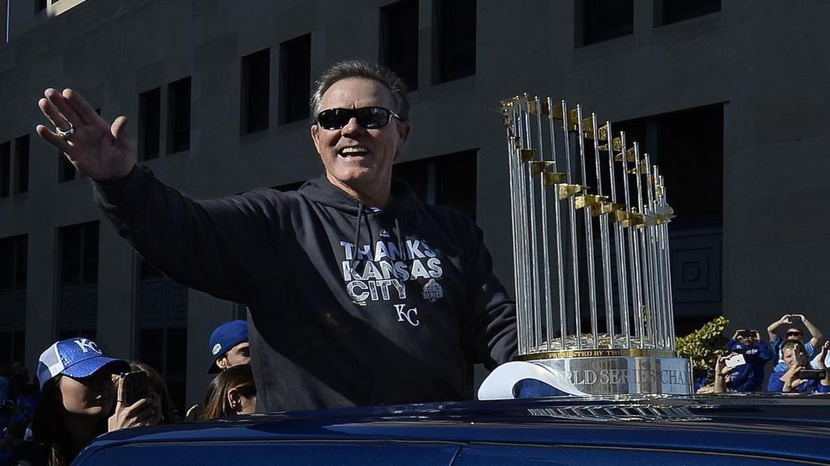 Royals manager Ned Yost rode with the World Series trophy on Tuesday, Nov. 3, 2015, as the World Series parade moved through downtown Kansas City near 9th Street and Grand Boulevard.