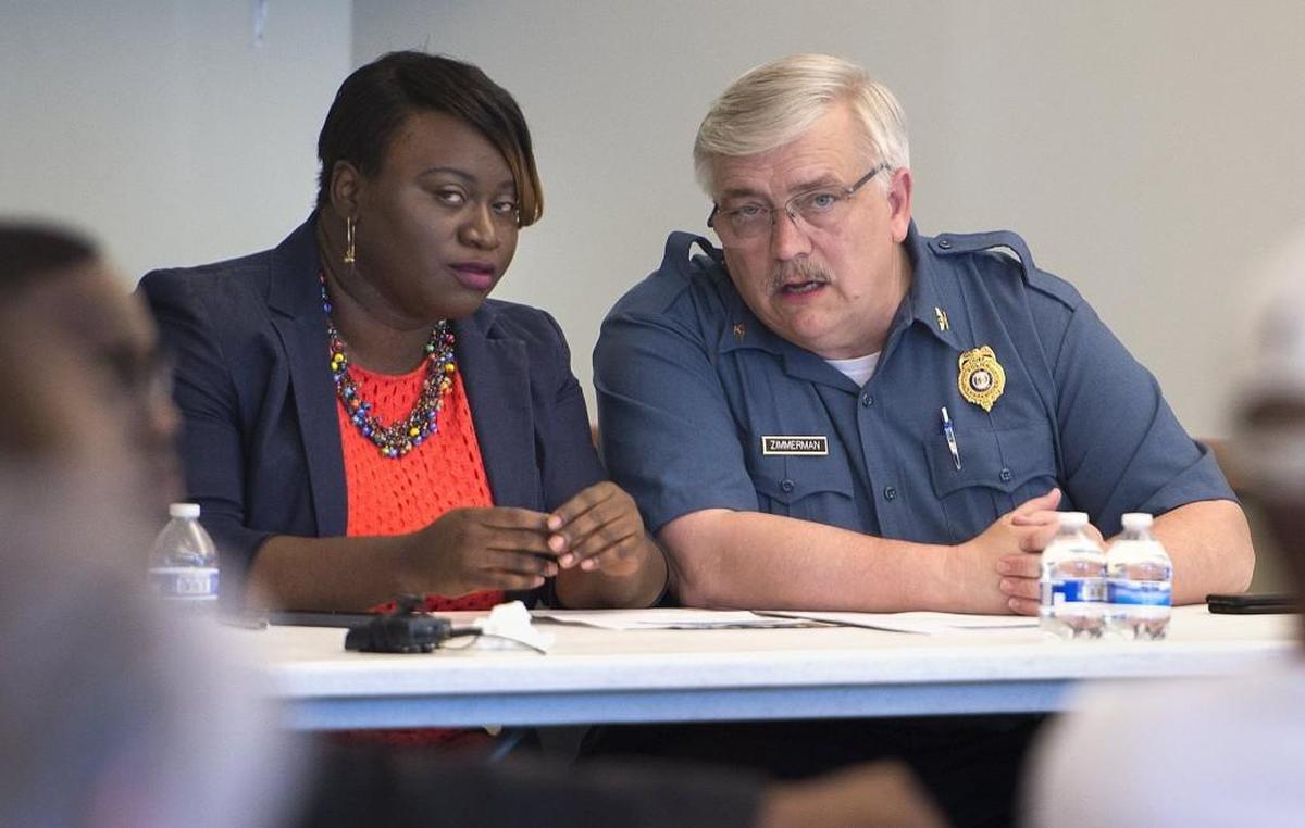 Kansas City’s 5th District Councilwoman Alissia Canady spoke with Interim Police Chief David Zimmerman at a community meeting at the Southeast Community Center. Canady said she was impressed with how Zimmerman handled a pointed question about how the city was addressing violent crime.