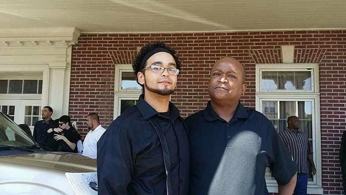 Dominique White (left) with his father, Kelly White