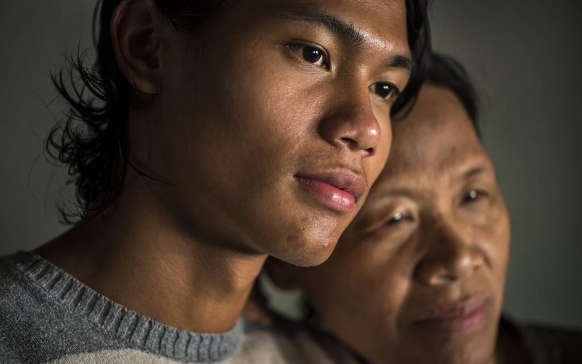 
Van Lai Lian (left) and his mother, Tial Cual, lived through a dangerous escape from Myanmar.
