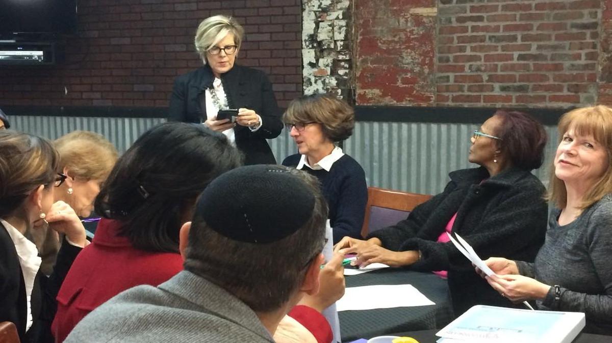Kristin Wing talked with volunteers putting the finishing touches on Satuday’s Kansas City women’s march and rally.