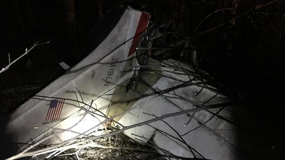 Three people and a dog aboard a flight from Kansas City to Maryland died when the plane crashed in a wooded area in southeast Indiana. The plane was a single-engine Cessna with a tail number of N761YZ.