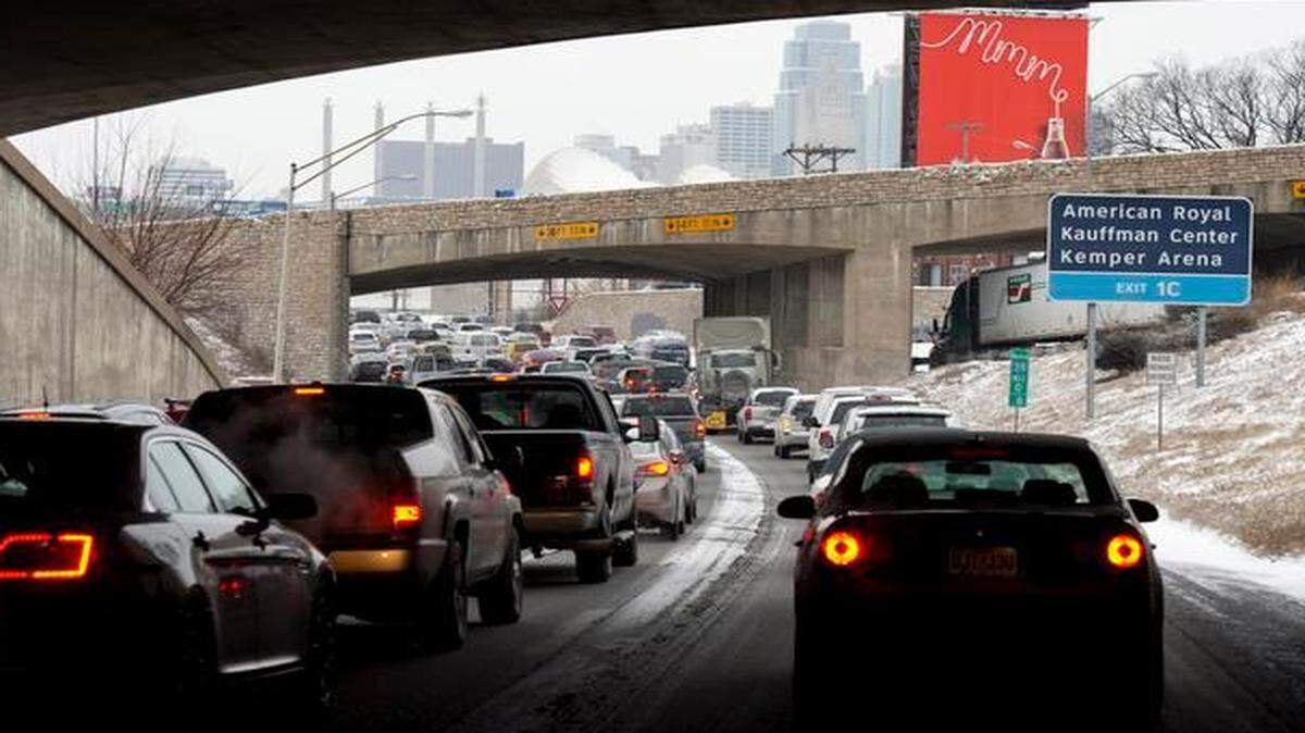 
Traffic on Interstate 35 headed into downtown Kansas City was stop and go at 4:30 p.m. Thursday. Afternoon snow left streets in slick, snarling traffic in all directions around downtown.
