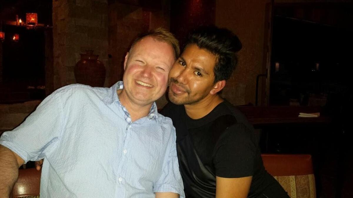 Carlos Bringas-Rodriguez (right) was deported to Mexico despite a federal court order protecting him. He was reunited with his husband, Michael Young, in Kansas City on Tuesday.