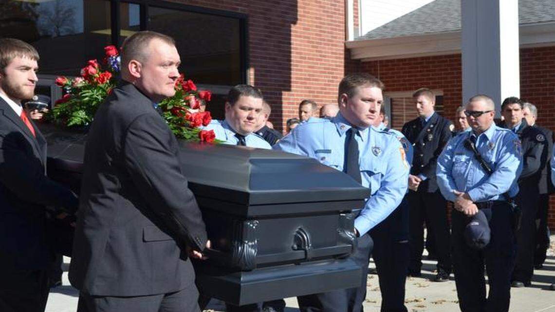 
The casket of 23-year-old Josh Burdick was carried Monday from First Baptist Church in Raymore to a South Metro Fire District fire engine. From there, it was taken to the Raymore Cemetery.
