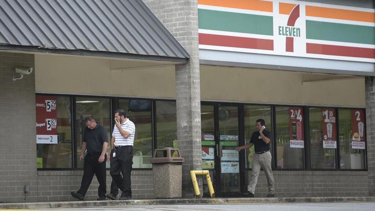 
Merriam Police and Crime Scene Investigators from the Johnson County Crime Lab were on the scene of an armed robbery at at 7-11 convenience store where a clerk was shot early Wednesday, Sept. 2, 2015, at 68th Street and Antioch Road in Merriam. The clerk was reportedly in stable condition.
