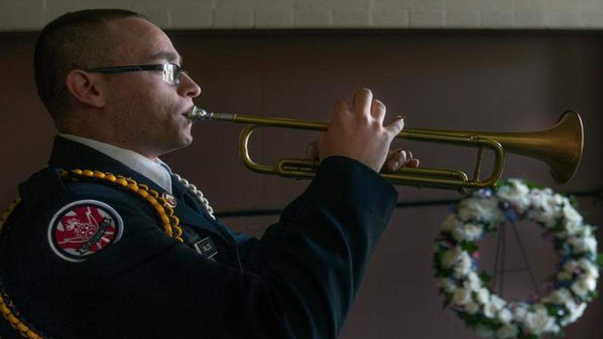 
Regan Malone, a freshman at Wentworth Military Academy and College in Lexington, Mo., practiced taps in the Truman Library garage Sunday before the Veterans Day Tribute held in Independence.

