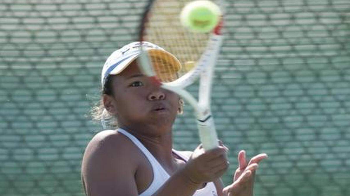 
Pembroke Hill junior Yurie Heard hits a volley during the MSHSAA Class 1 Championship match at Cooper Tennis Complex in Springfield on Saturday, Oct. 18, 2014.
