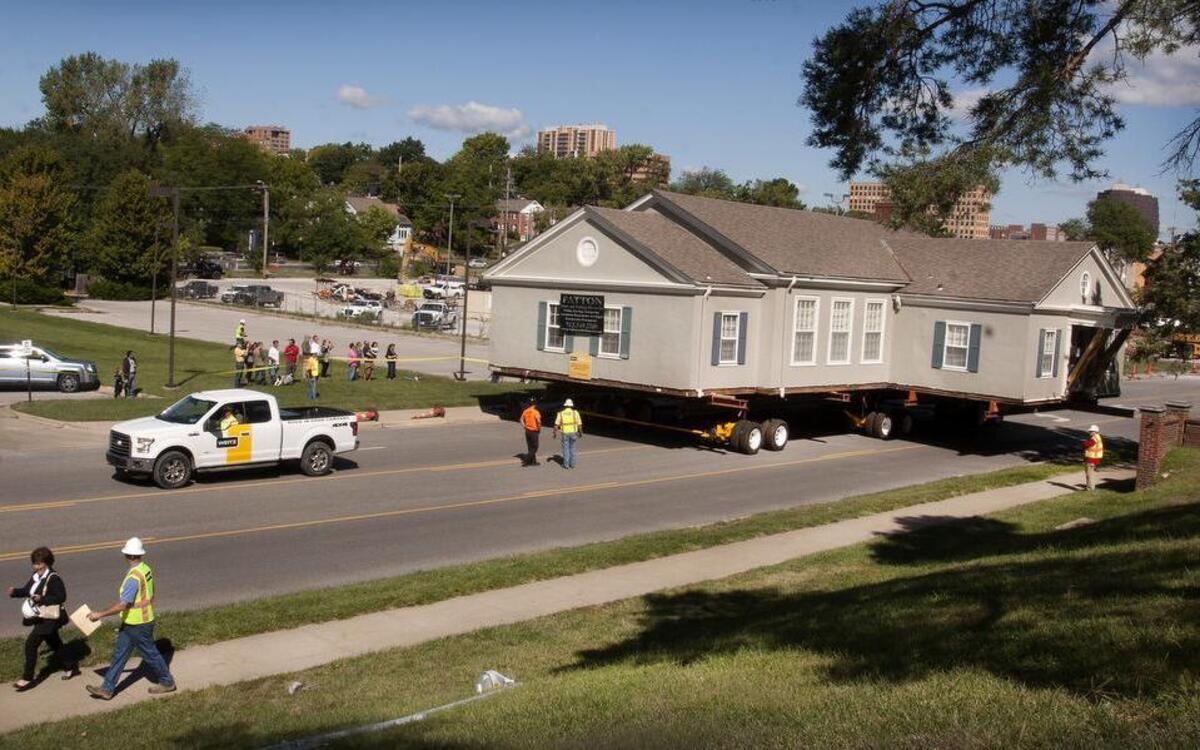 
The Kansas City Young Matrons’ 79-year-old clubhouse was moved Saturday from 51st and Oak streets to 52nd and Cherry streets to make way for a development project. Over the next week, the clubhouse will be set on its new foundation. 
