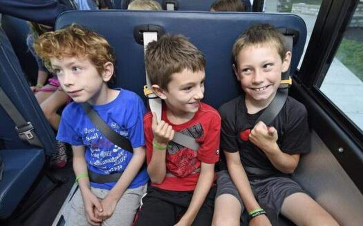 
Pembroke Hill school is using new school buses equipped with seat belts, three to a row. Students in the school’s summer program, including Morrison Terrell, 9 (from left), Luke Martinovic, 9, and Gavin O’Toole, 9, were buckled up and ready to head to Linwood, Kan., for a field trip recently. When asked about the seats belts, Gavin O’Toole gave the thumbs-up. 


