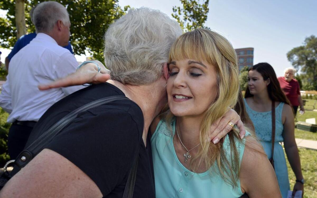 
Shelly Frank (right) of Ottawa, whose mother and stepfather were killed in the 1981 Hyatt skywalks collapse, hugged her mother’s friend Pat Clark of Shawnee at a ceremonial groundbreaking for a memorial.
