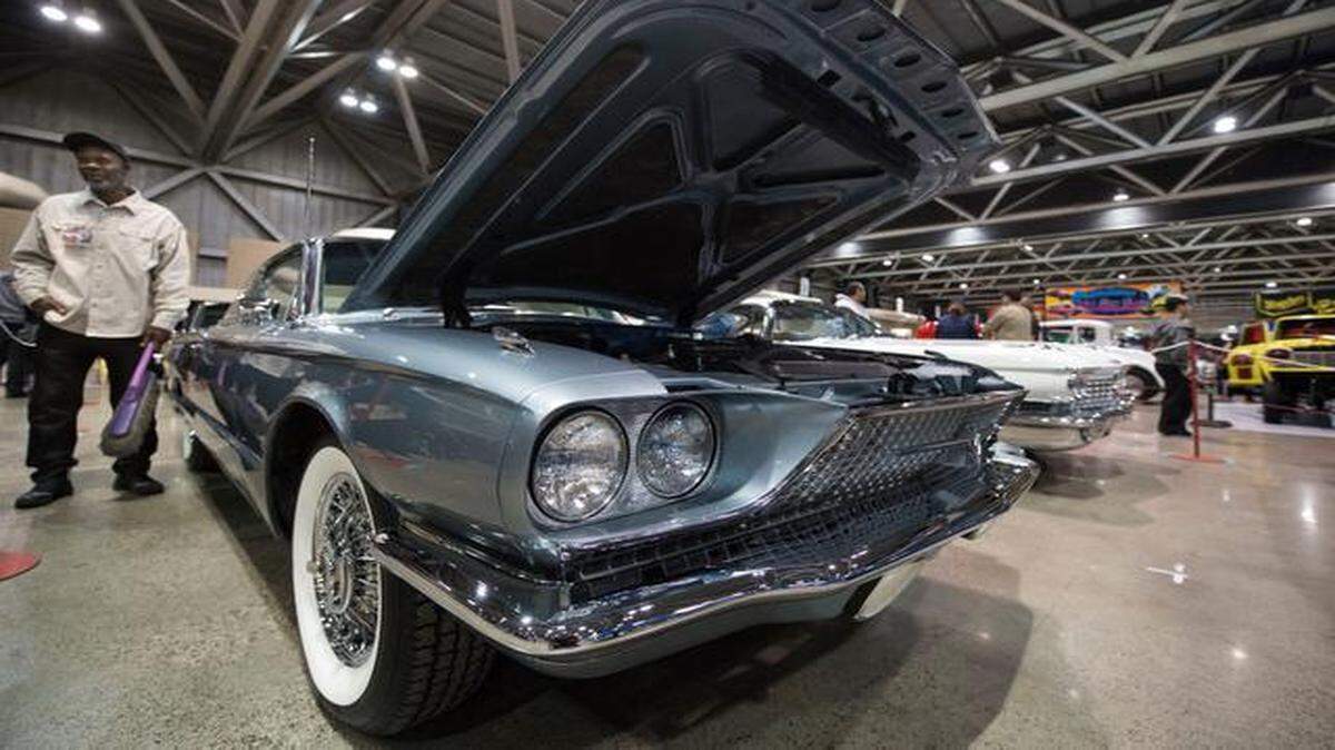 
Derek Chamberlain of Kansas City talked Saturday to passers-by at World of Wheels in Bartle Hall about work he did on a 1966 Ford Thunderbird.
