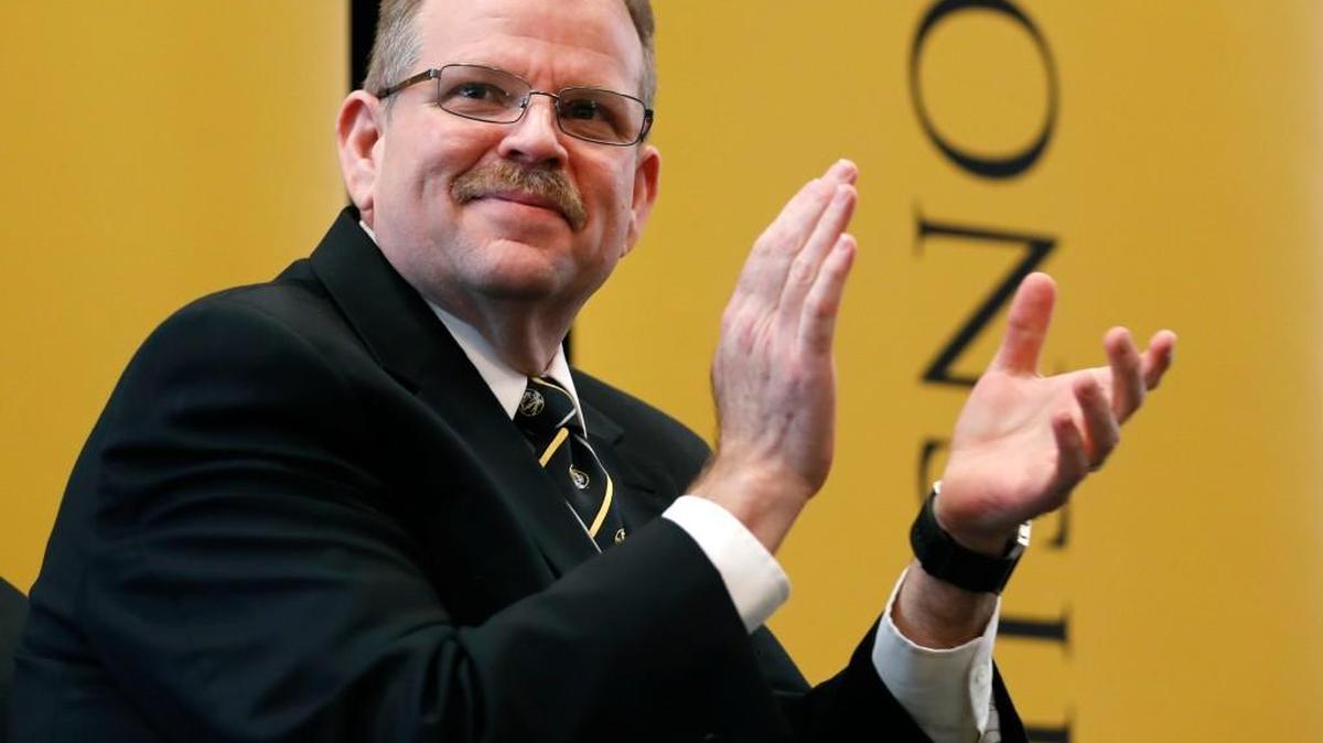 Alexander Cartwright applauds during an event announcing him as the new chancellor of the University of Missouri-Columbia on Wednesday in Columbia. Cartwright comes to the the University of Missouri's flagship campus after serving as the provost and executive vice chancellor at the State University of New York.