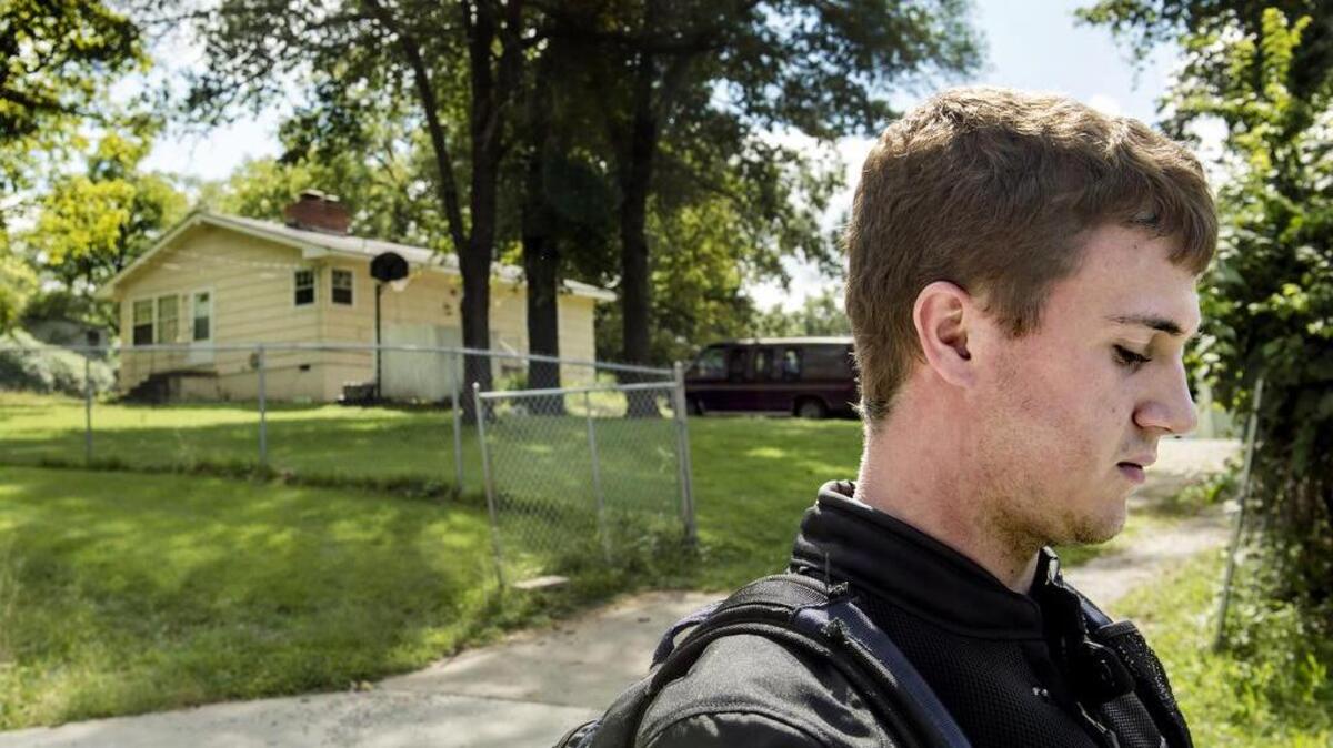 Michael Mullally talked about the victims of a triple homicide who were his acquaintances near the scene of the killings on Wednesday, Sept. 9, 2015, in south Kansas City. 
